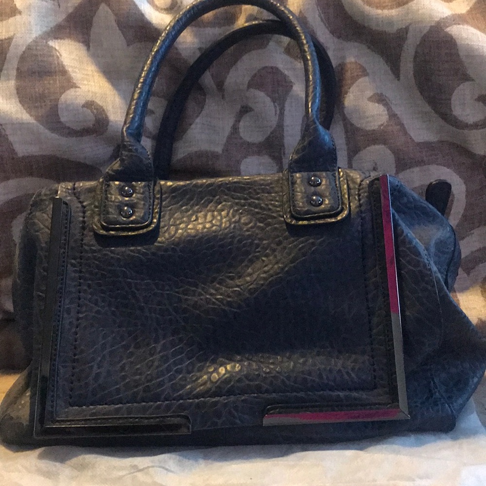 Blue leather bag.